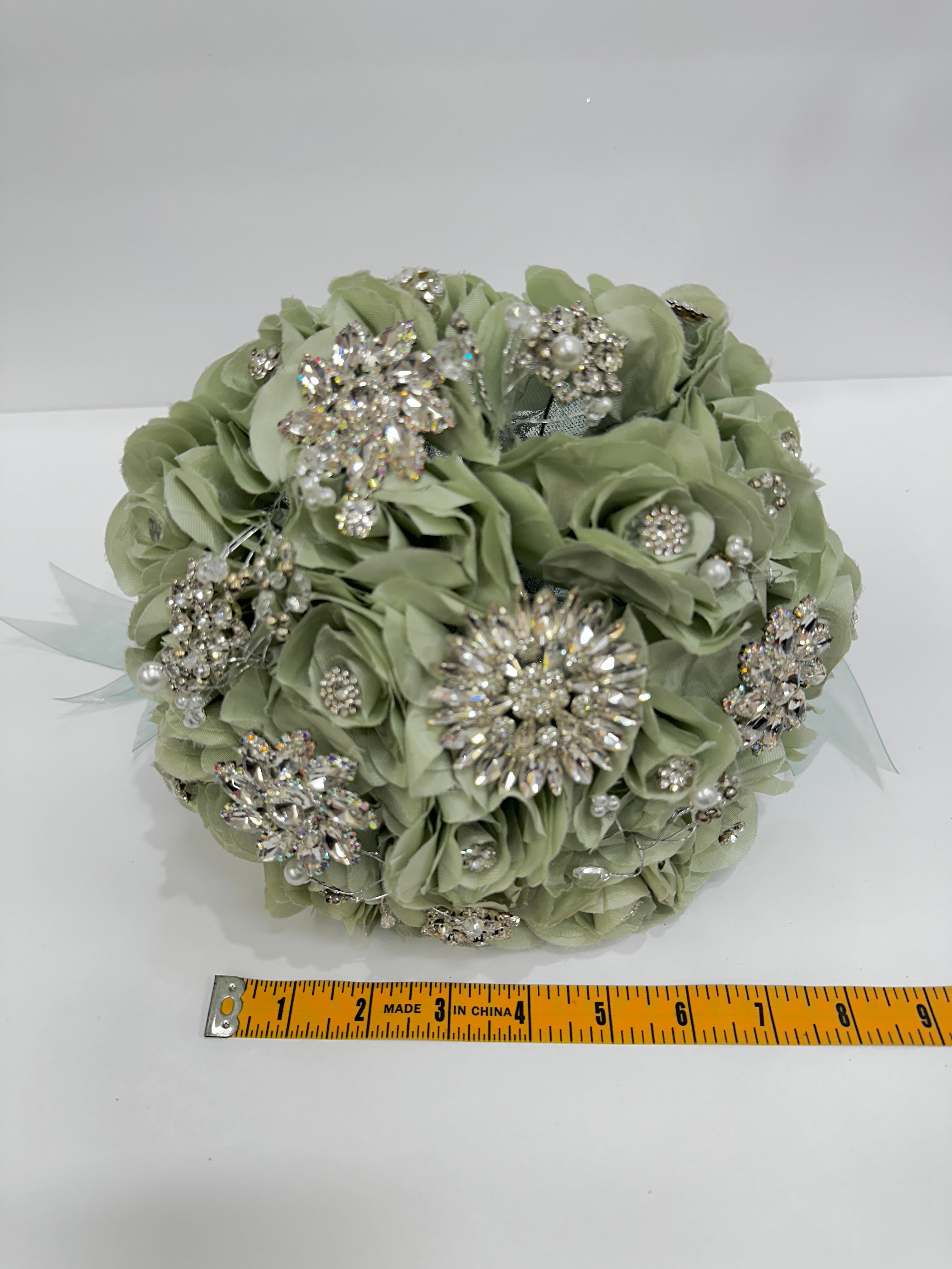 sage Green floral bouquet with silver embellishments, measured with a ruler.