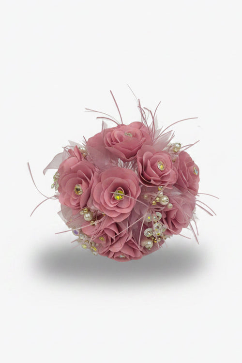 Pink flower ball with decorative elements on a white background
