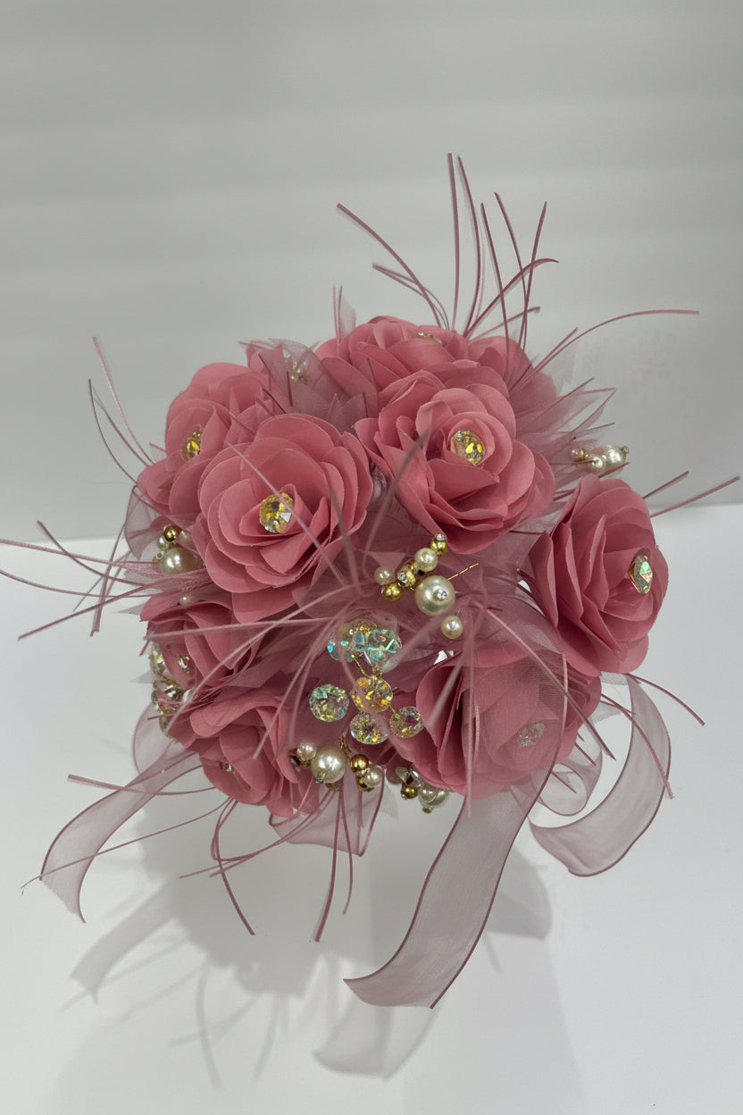 Pink floral bouquet with decorative elements on a white background