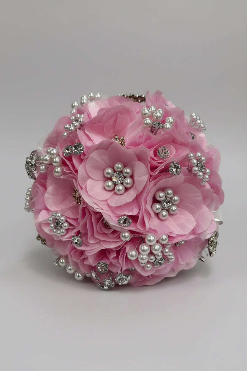 baby Pink floral bouquet with silver embellishments and white pearl beading  on a white background