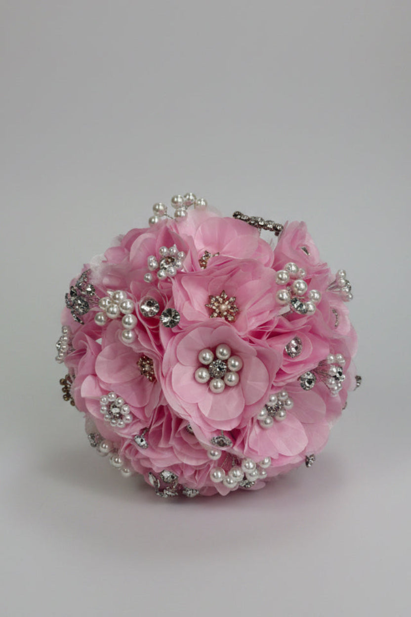 baby Pink bouquet with silver embellishments and pearl beadings on a white background