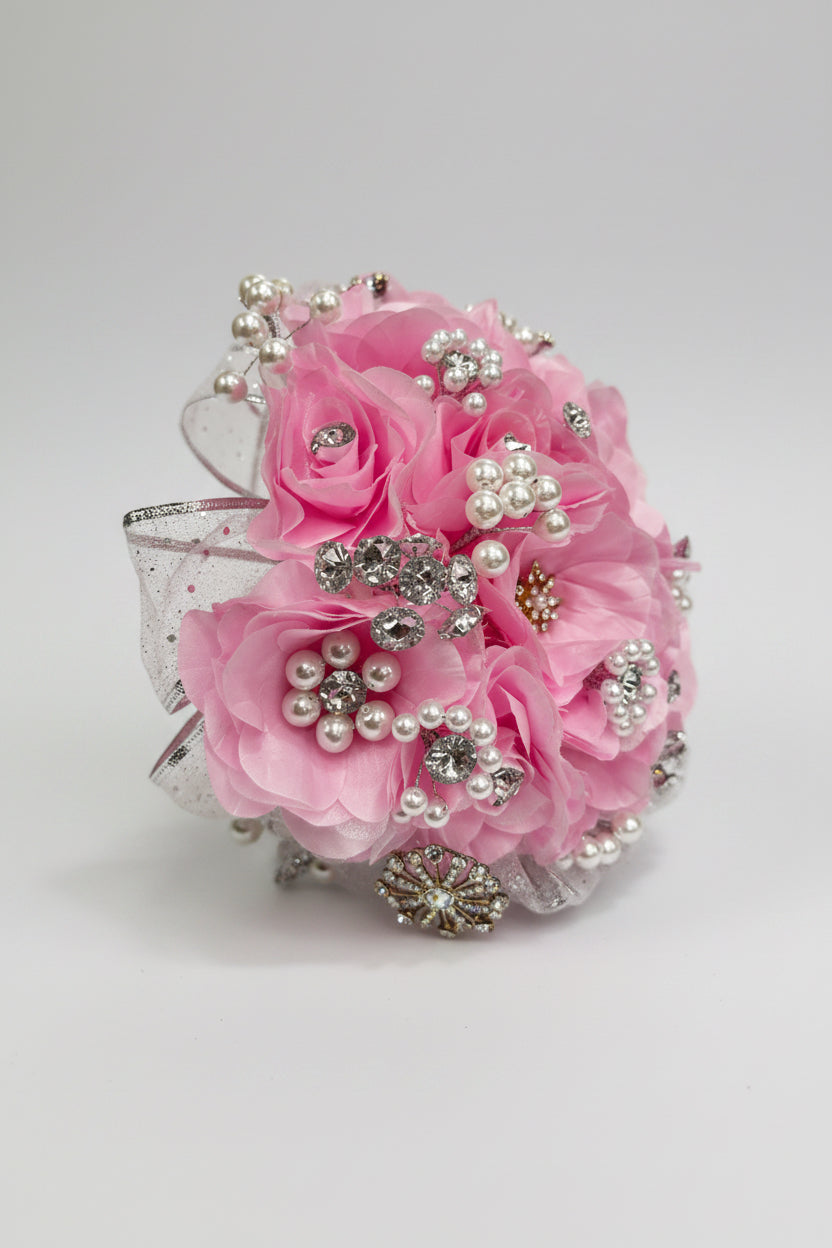 Pink flower bouquet with pearls and silver application on a white background